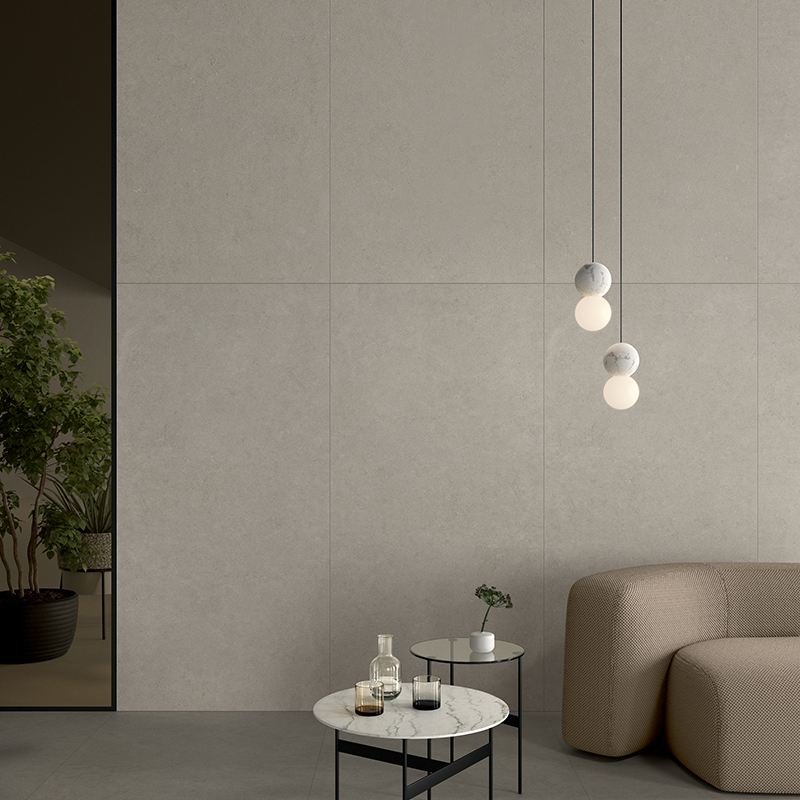 Inspired by limestone with its clastic granules and microfossil inclusions.