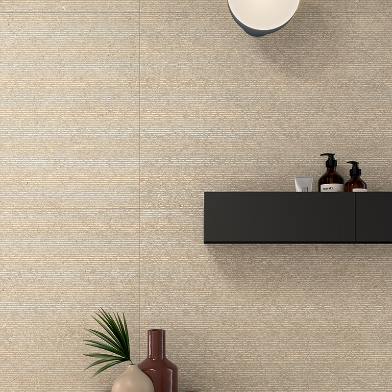 Inspired by limestone with its clastic granules and microfossil inclusions.